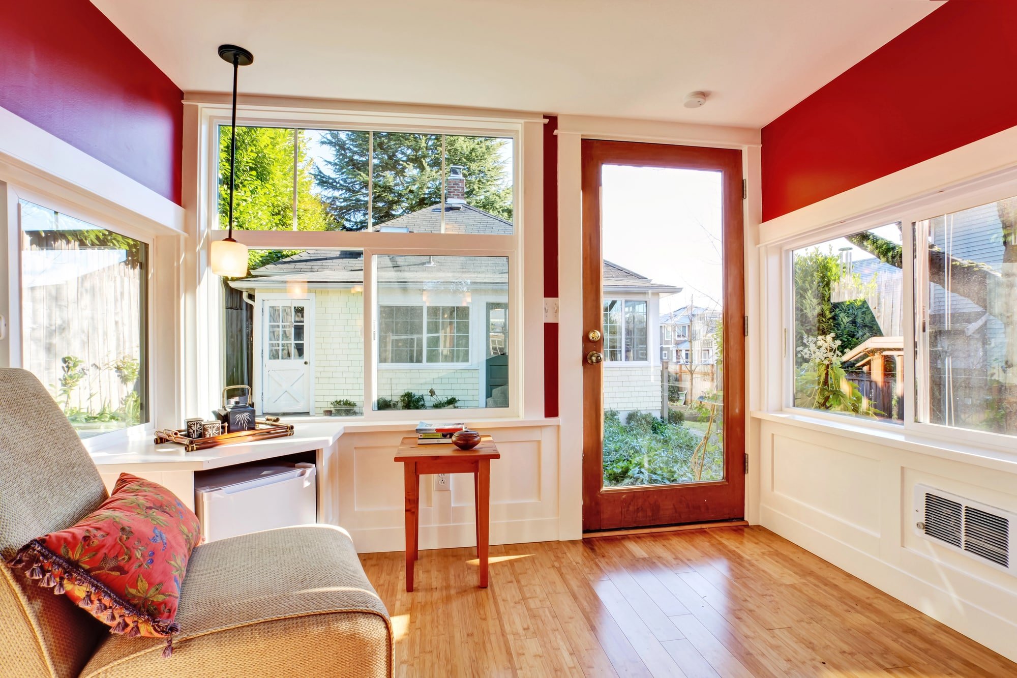 Airbnb photo captions: The interior of a detached guest house vacation rental cottage boasts ample natural light and warmth.